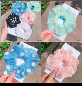 buộc tóc bé gái