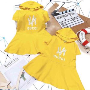 Đầm thun bé gái nón Gucci
